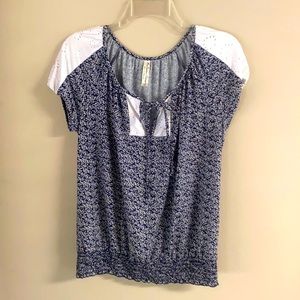 Blue and white flower shirt with elastic waist